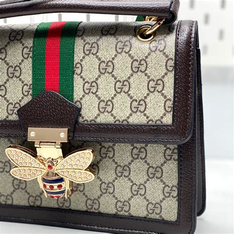 gucci replica bee clutch|gucci handbags false.